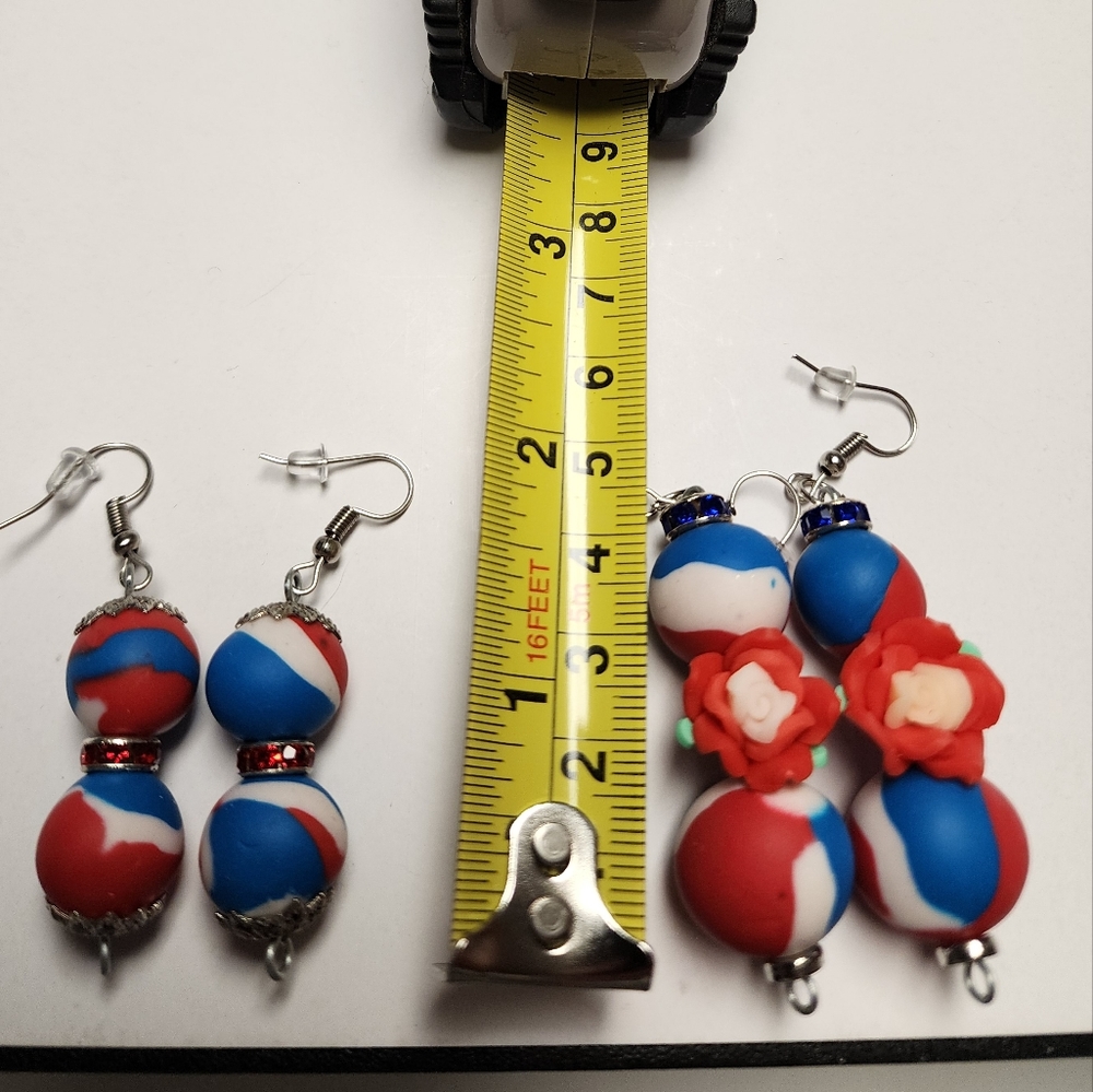 Two pairs of red, white and blue handmade dangle polymer clay bead earri…